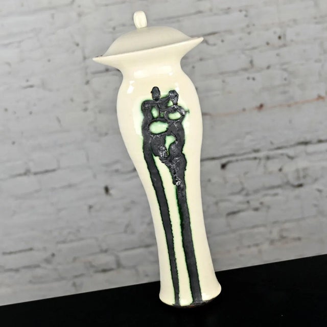 Gorgeous vintage white, green, & black ceramic lidded vessel signed Pritchard Spring 75. Beautiful condition, keeping in...