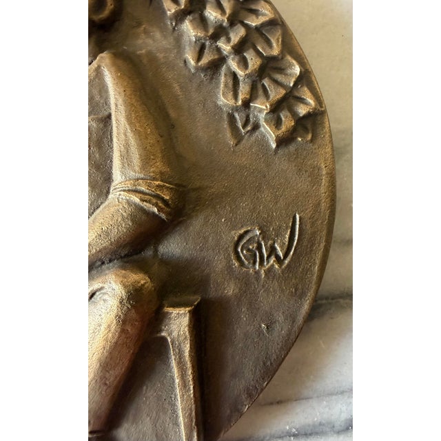 ## Description This mid-century modern solid cast bronze wall relief plaque is by German sculptor Egino Weinert...