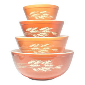 1970s Pyrex “Autumn Harvest (Wheat)” 4-Piece Orange Glass Mixing Bowl