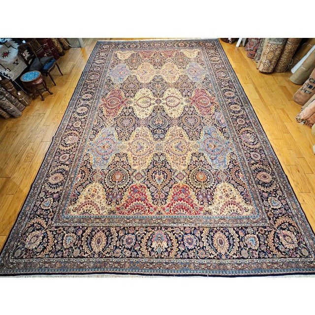 You will be enchanted by the grand scale and magnificent artistry of this beautiful Persian Kerman Palace Size Rug,...