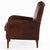 This warm chocolate brown chair is in very good condition and sits well with squared crest, slightly rolled arms and a...