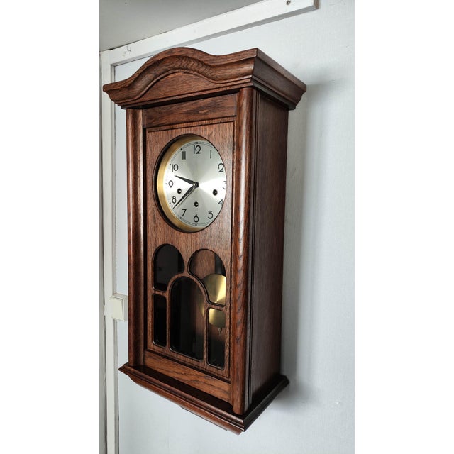 A vintage mechanical wall clock by Jauch, marked “P.L. 37 cm – Western Germany,” dating to the 1960s–1970s. This 8-day...