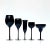 Black stemmed decorative glasses, group of 11. A glamorous curated decorative group of black stemmed glasses from the mid...