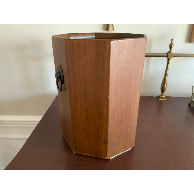 Nothing says sophistication like a proper waste receptacle. This English style wooden beauty will add an element of grace...