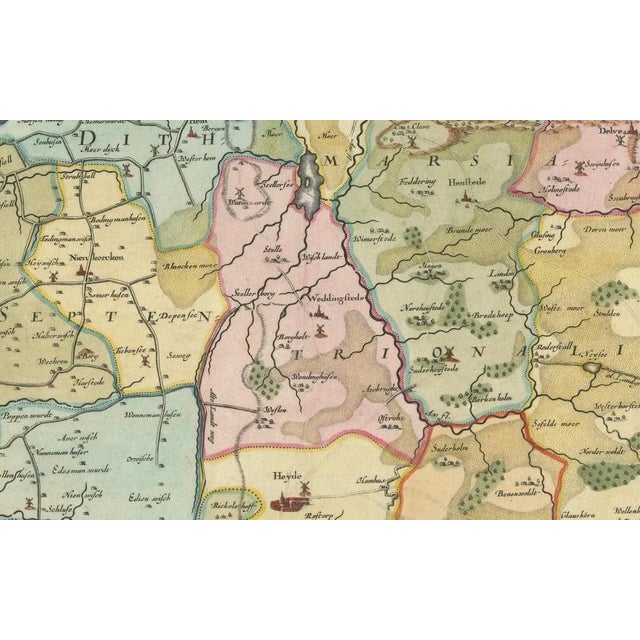 This is a detailed colored copperplate engraving depicting northern Dithmarschen, accompanied by town plans of...