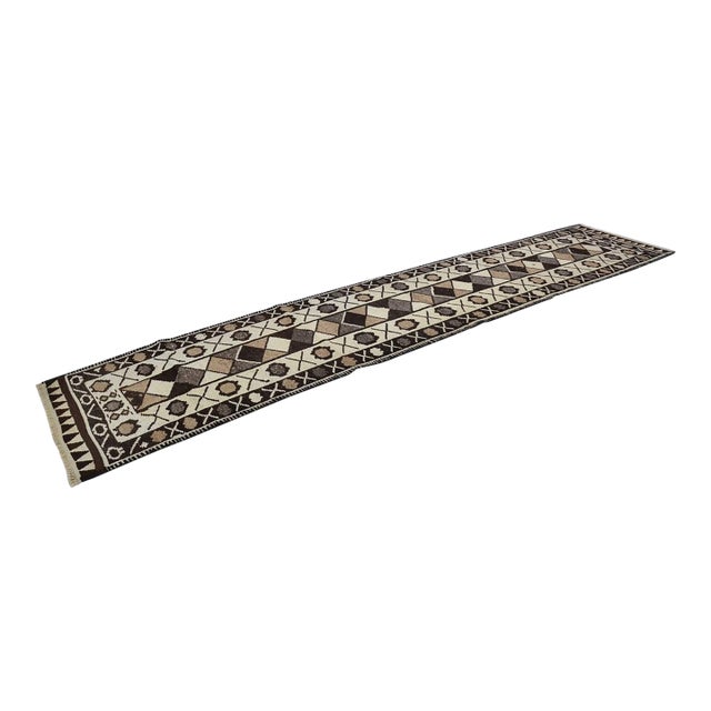 Vintage Anatolian Wool Runner, Hand-Woven Geometric Kilim With Earth Tones For Sale