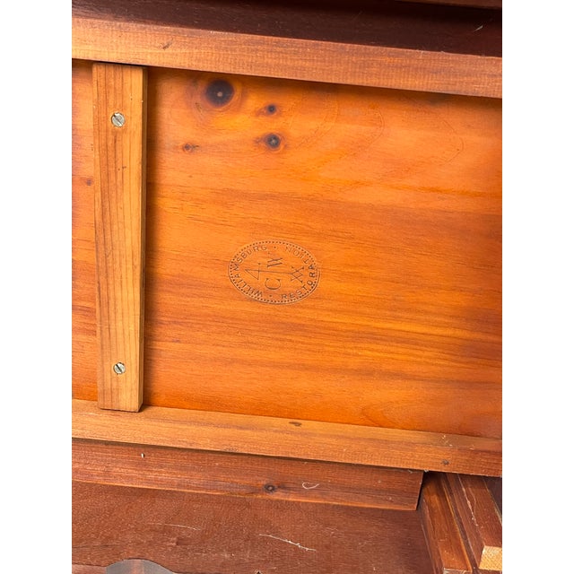 A beautiful Queen Anne style tea table crafted in solid mahogany by Kittinger, featured as part of the official Colonial...