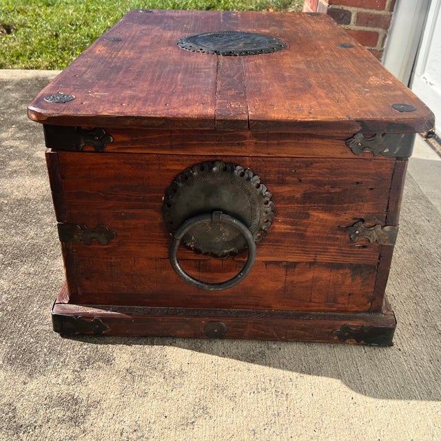 Antique Mexican Spanish Colonial Wooden Bau’l Chest With distinctive hand-forged iron medallions Approximate measurements:...