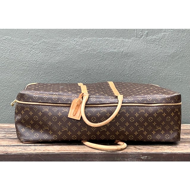 Travel in timeless style with the iconic Louis Vuitton Sirius 70, the largest of the storied fashion house’s soft-sided...