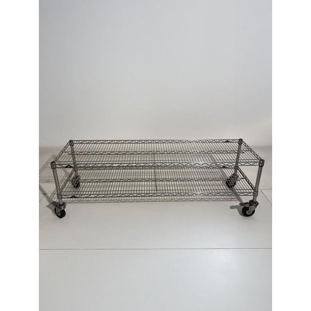 Joint service cart by Metro Design, originally produced in 1990. Multipurpose two-shelf cart made of chromed steel rod....