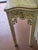 The painting on this piece is pristine. The edging is gold leaf. I love the colors of golds, yellows, navy, pinks, greens...