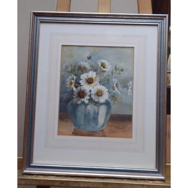 M. Beech, Daisies in a Vase, Watercolour, circa 1960s Material: Watercolour on Paper, Silver-Tone Frame, Glass A charming...
