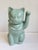 Whimsical vintage celadon glazed Maneki-neko lucky cat figurine featuring a soft seafoam green porcelain finish with a...
