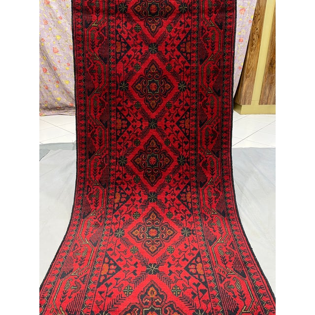 1990s Extra-Long Red and Navy Tribal Medallion Runner Rug, 2'7" X 19'1" For Sale - Image 5 of 16