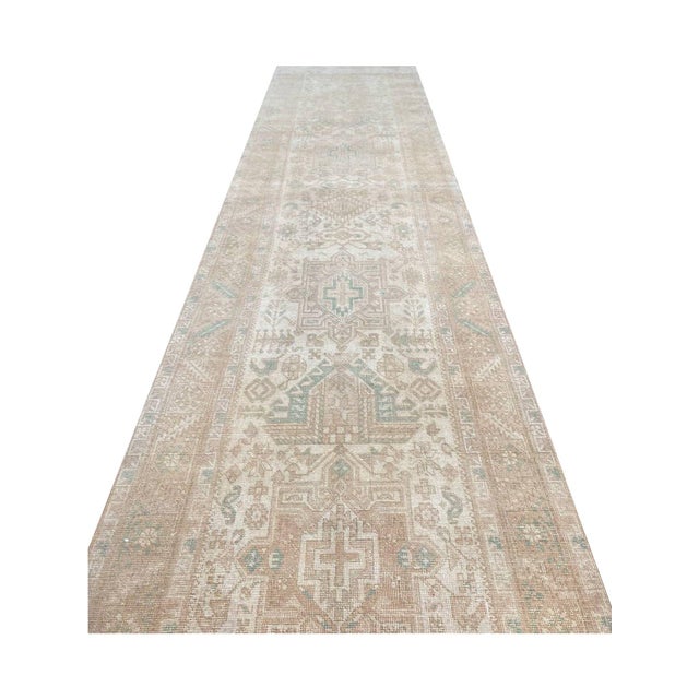 Exact Size: 3’6″ x 13’10” Color: Natural Age: Old Materials: Wool Construction: Hand Knotted Origin: Iran
