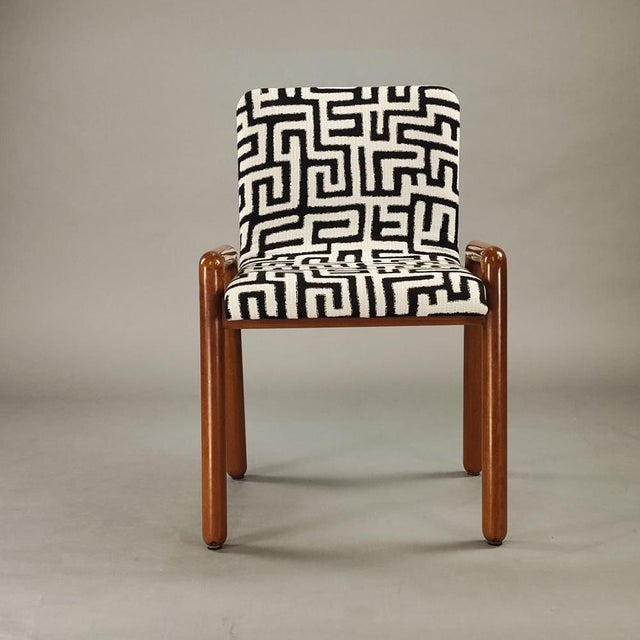 Set of 10 Dilos chairs by Guido Faleschini for "I 4 Mariani," featuring a 1970s design. Curved beech wood legs, new black-...