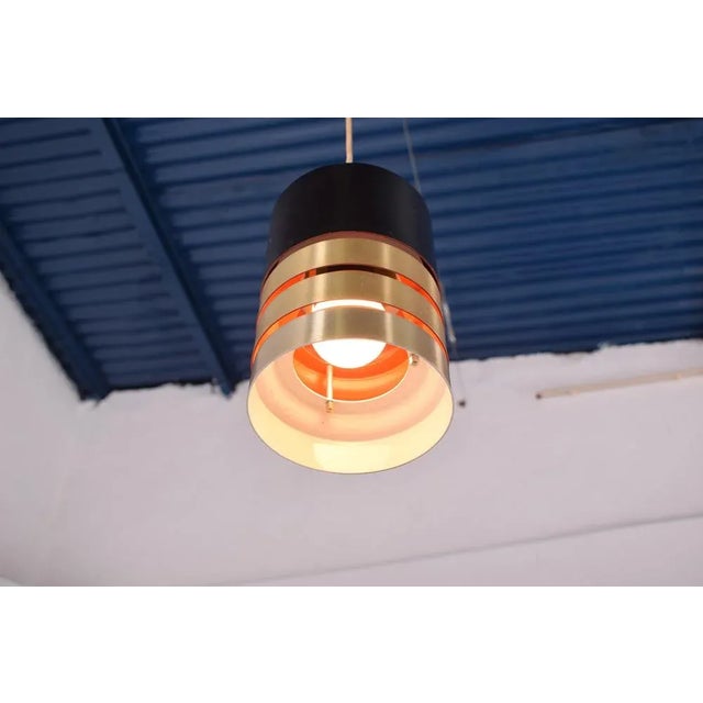 Pendant lamp, designed by Jo Hammerborg and manufactured by Fog & Mørup in Denmark, 1960. Made of 4 aluminium rings...