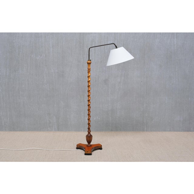 This very rare floor lamp was produced in Sweden in the 1930s in the Swedish Grace style. The base is marked with the name...