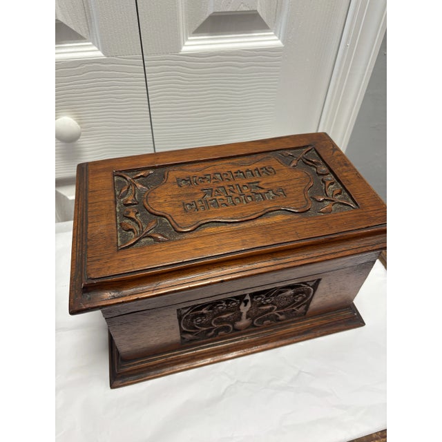 This vintage hinged-top box is a stunning example of fine craftsmanship, with its beautifully and intricately carved...