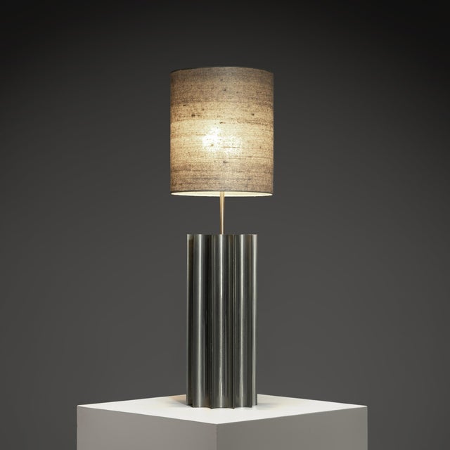 This very rare, large table lamp by Ingo Maurer is an exceptional example of late 1960s German modernist lighting design....