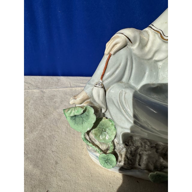 Up for consideration is a beautiful ceramic Asian woman statue. This would look lovely in your home and is a great find...