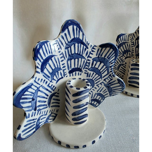 Shellegance design for Anthropologie Blue and white candleholders in a shell motif