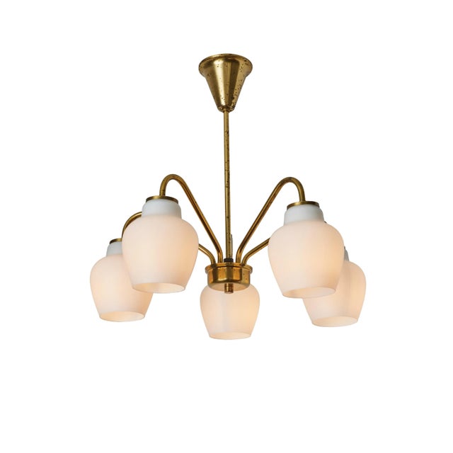 Large Bent Karlby 5-arm glass and brass chandelier for Lyfa. Executed in patinated brass with five opaline blown glass...