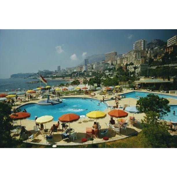 Monte Carlo Beach Club 1970 Guests around the pool at the Monte Carlo Beach Club, Monaco, August 1970. (Photo by Slim...
