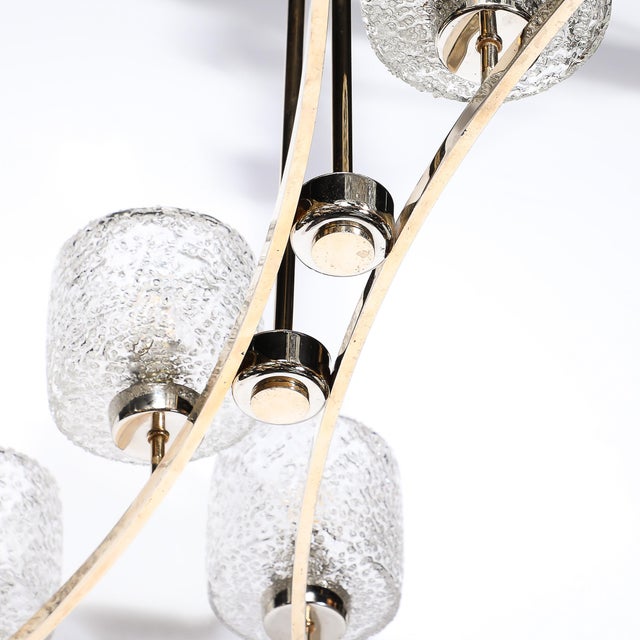 This stunning Mid-Century Modernist Bow Form Polished Brass & Nickel Pendant Chandelier W/Mottled Glass Shades originates...