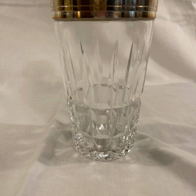 Make your martinis in style with this exceptionally fine cut French, Crystal and Silverplated cocktail shaker by the world...