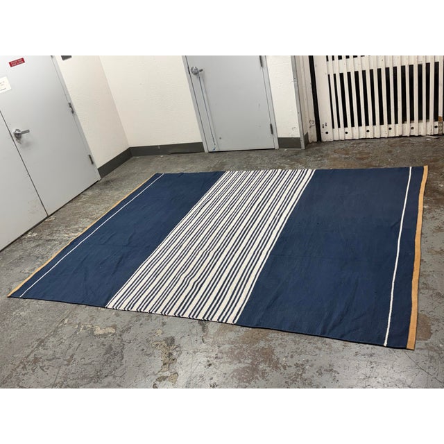 Design Plus Gallery presents the 7ft 7in × 10ft Signature Cotton Dhurrie Rug from Serena & Lily. This handwoven rug is...