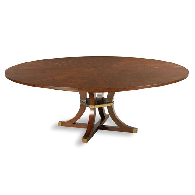 A wonderful expanding table with transitional styling. The top expands using a patented mechanism dating back to 1835 by...