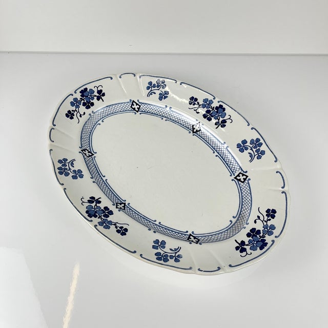 Oval Terre de Fer KG Lunéville platter, "Jane" pattern, blue, 1890-1915 Dimensions: 35 x 25 cm Height: 4 cm Antique item...