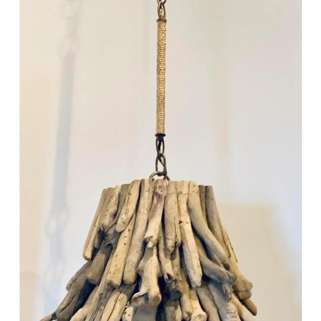 Stylish Currey & Co. Organic Modern Driftwood Chandelier, one light, showroom floor sample