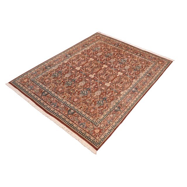 Designed with mesmerizing intricacy and gorgeous color palette, this hand-knotted masterpiece demonstrates the beauty and...