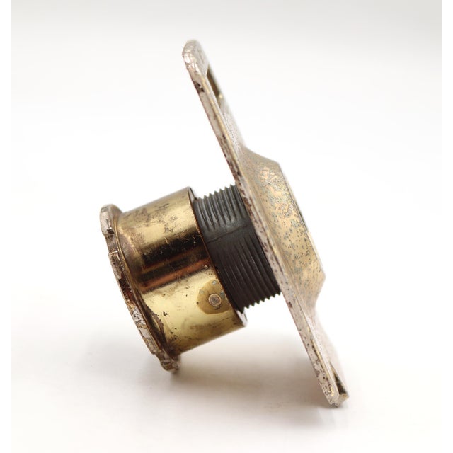 Reclaimed vintage brass peephole with a fading nickel finish. Good condition with surface wear and rust from prior use....