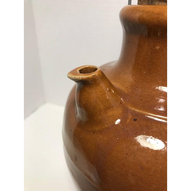 19th Century Brown Glazed Stoneware Jug With Wire Handle & Cork Aprox. dimensions: 10"H Very good antique condition: no...