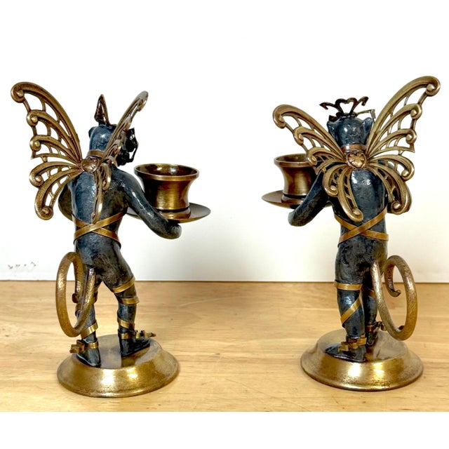 Belle Époque Style Winged Monkey Masquerade Chambersticks This captivating pair of vintage 20th-century "Singerie"...