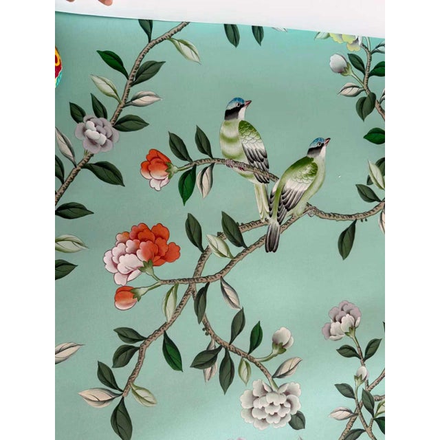 Soft, timeless, and full of quiet charm, this hand-painted Chinoiserie mural transforms an ordinary wall into an...