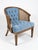 Embrace mid-century comfort with a touch of tropical flair in this vintage barrel chair, ideal as an accent piece in...
