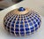 Handwrapped in seagrass, this 12" x 9"hand-thrown ceramic vessel adds a touch of coastal charm. Unique and finely crafted,...
