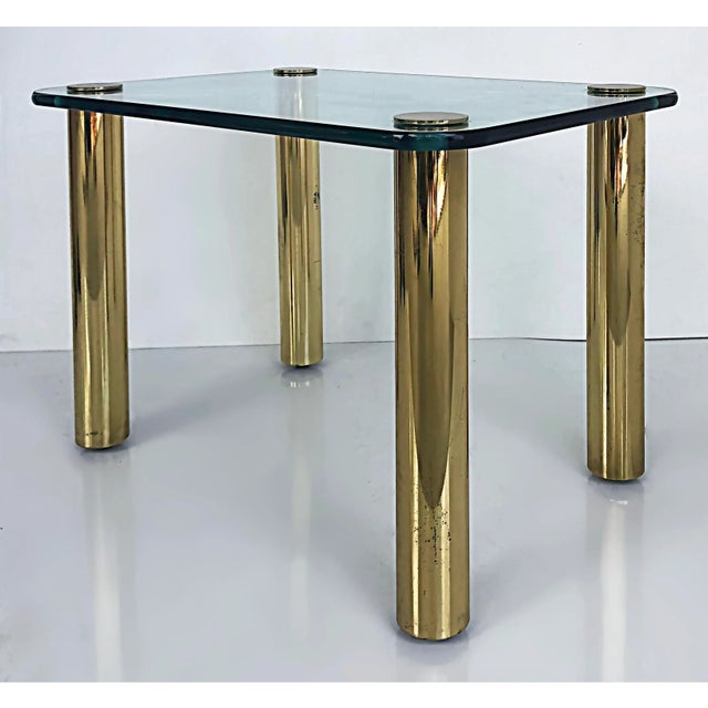 '80s Pace Collection Glass Top Side Table with Brass Legs Offered for sale is a 1980s Pace Collection side table with a...