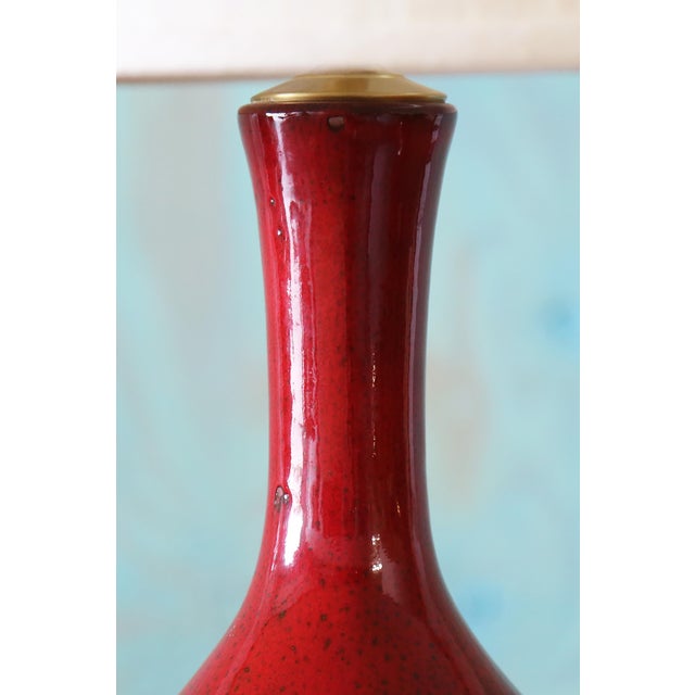 Statement monumental ceramic red lamps in a gourd shape. Beautiful speckled glaze provides movement and texture. Similar...