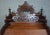 A rare, richly ornamented carved walnut harmonium in the neo-gothic and troubadour style of the late 19th century. This...