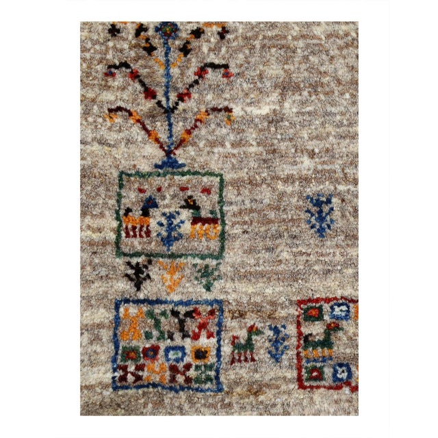 Gabbeh Rugs feature hand-spun wool in both the pile and foundation. These rugs are characterized by their abstract designs...
