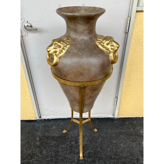Bring grand neoclassical elegance into your space with this stunning amphora-style floor vase. Inspired by ancient Greco-...