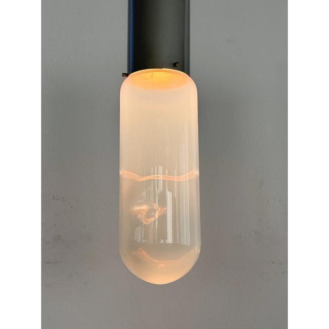 Italian Midcentury "Ata" Set Pendant Lights by Giusto Toso for Leucos, 1970 Rare pair of pendant lights called "Ata",...
