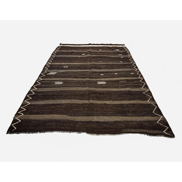 Modern vintage hand woven Kilim rug from Afyon region of Turkey. Approximately 50-60 years old. In very good condition