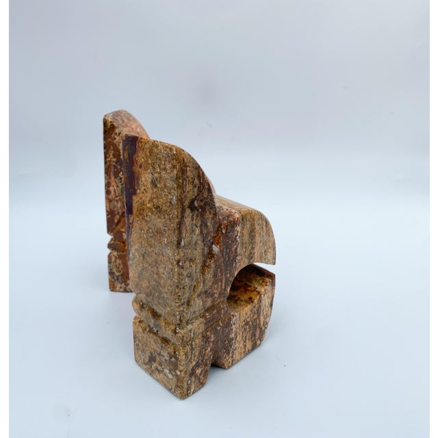 Unique pair of marble bookends carved into an elegant fleur de lis shape. Made of heavy and high quality natural stone,...