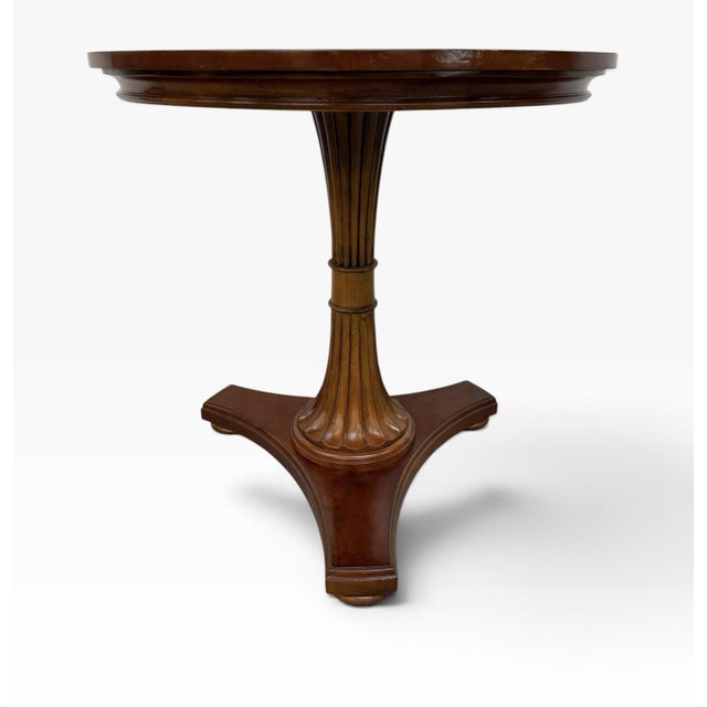 The Vintage Ethan Allen Townhouse Carved Pedestal Side Table is a stylish and elegant accent piece perfect for any room in...